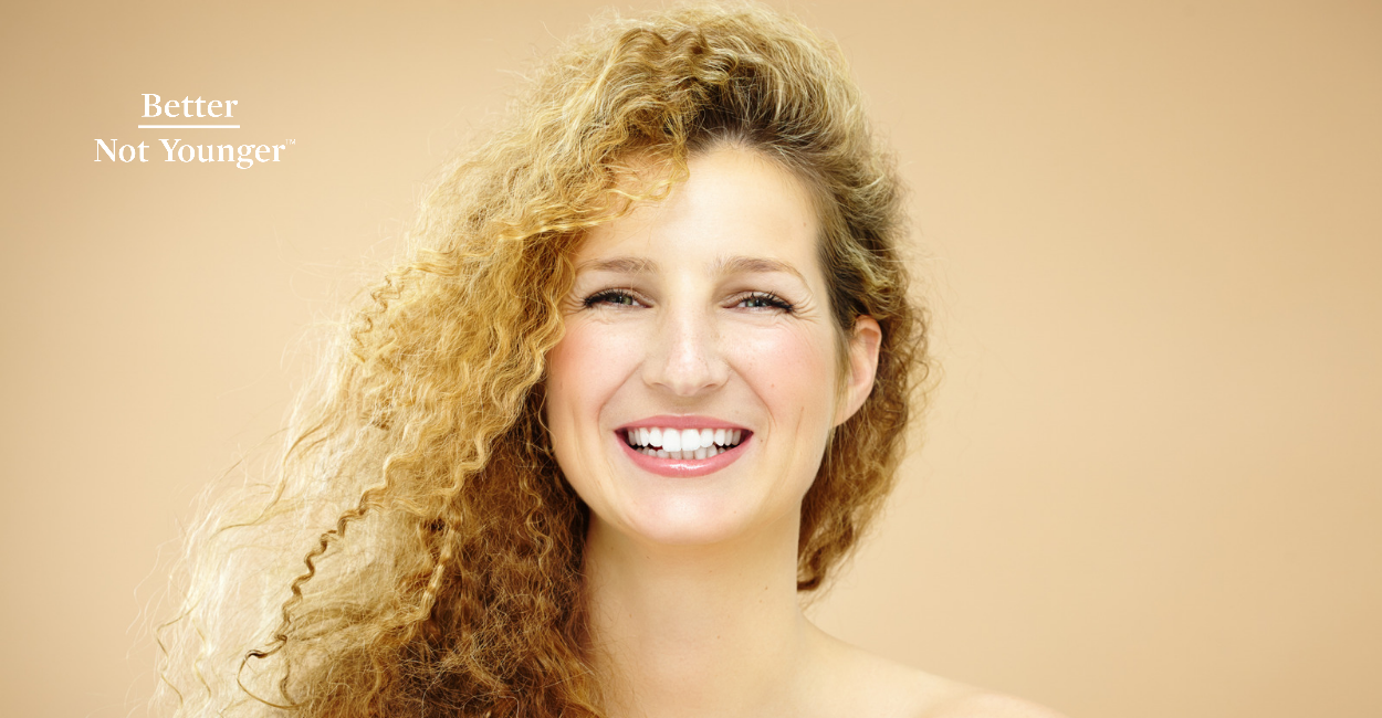 Mature woman with beautiful curly hair