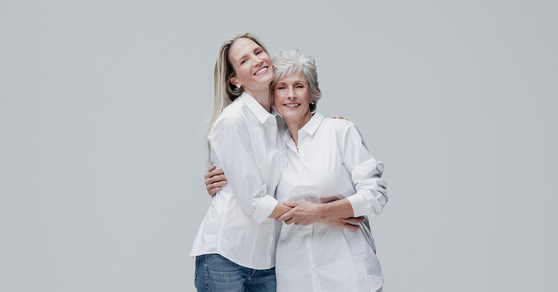 A loving mother and daughter with white and gray hair