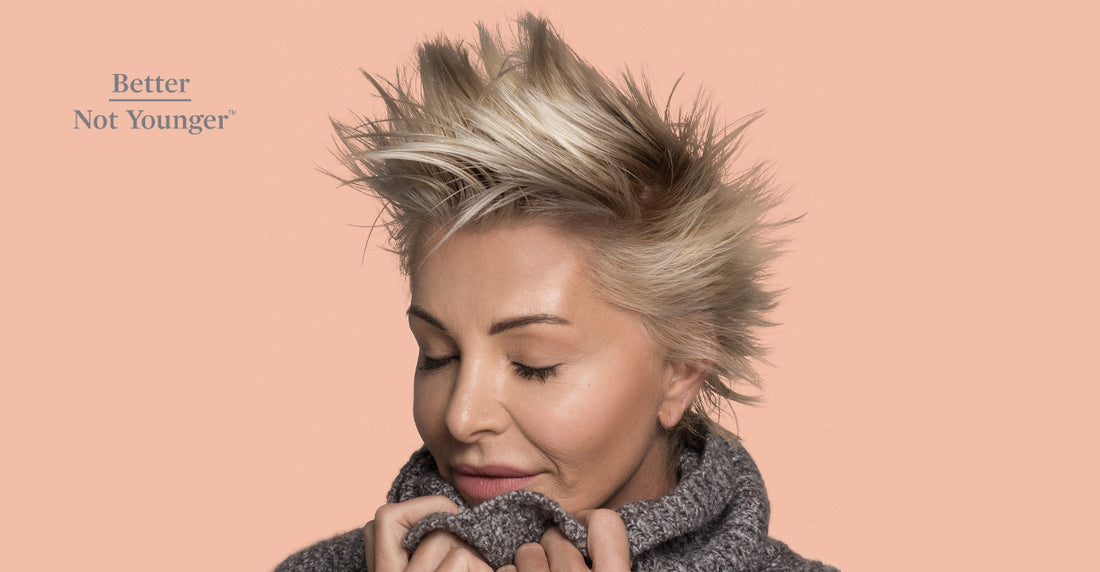 A woman over 40 with short blonde hair.