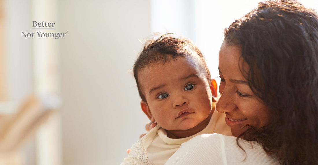 African-American mother posing with her baby.