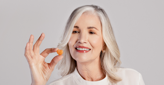These delicious and fortifying gummies hold by our beautiful gray hair model, assist your body's creation of better hair from the inside out by: