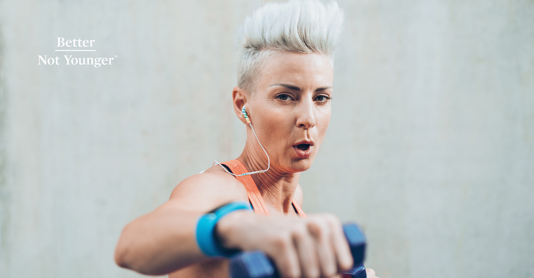 For "7 Biases Women Over 40 Beat Every Day", Better Not Younger features a woman over 40 with short gray stysh hair working out and looking strong.