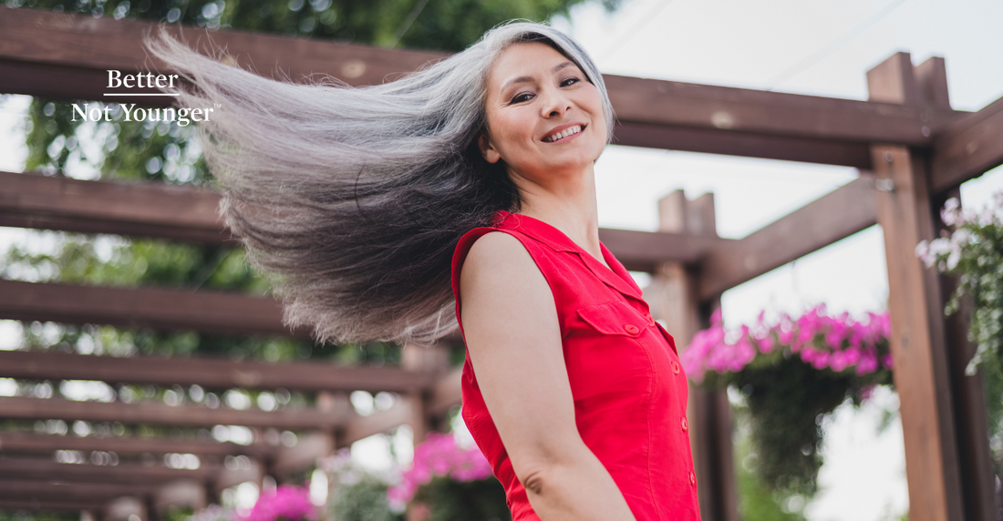 Better Not Younger features a woman with long gray hair outdoors during summer.