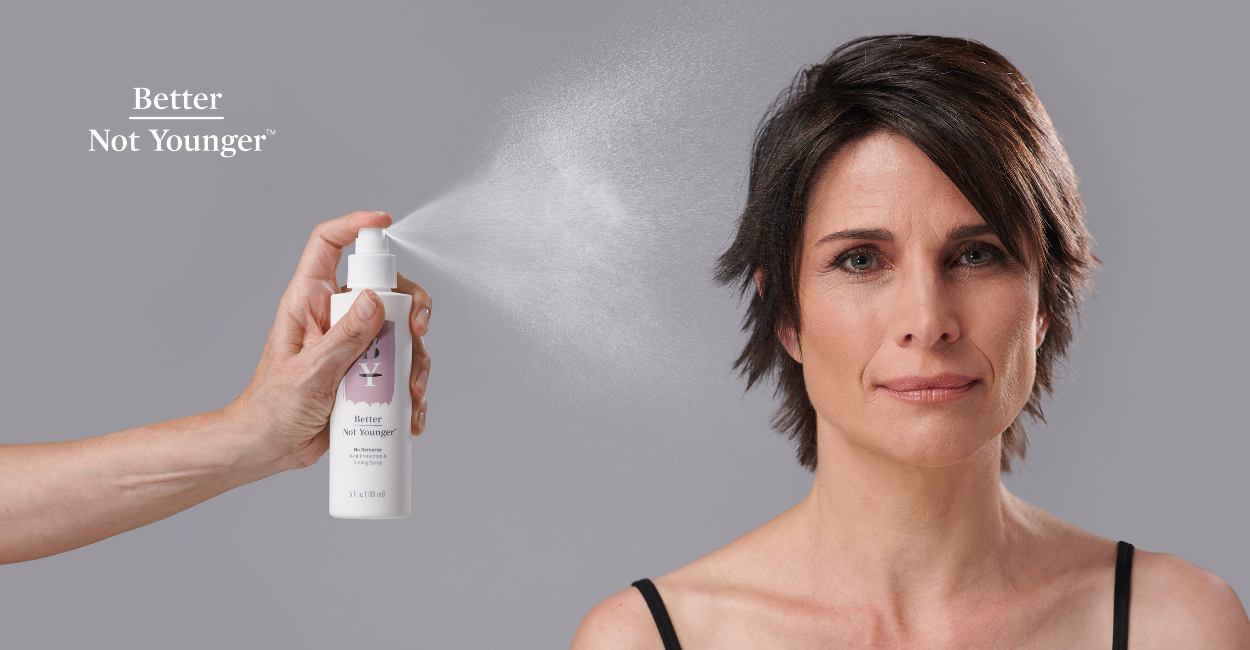 "Everything You Ever Wanted to Know About No Remorse Heat Protection & Taming Spray" by Better Not Younger is featuring a mature woman with short brown hair getting a splash of the best heat protection spray.