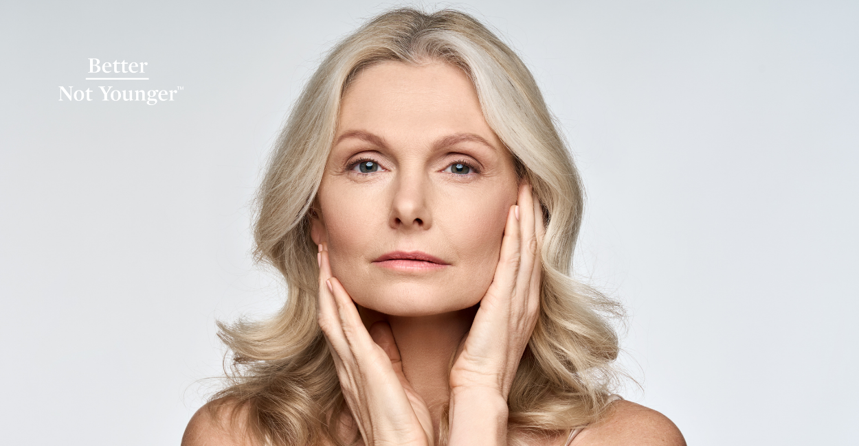 BNY features an Adult senior older woman touching her perfect skin.