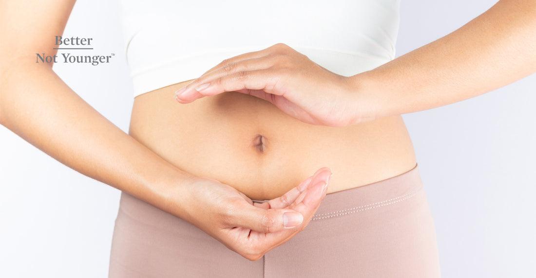 Better Not Younger features a woman over 40 eating a salad as her gut health  might be related to hair loss. She has long blonde hair and looks happy. 