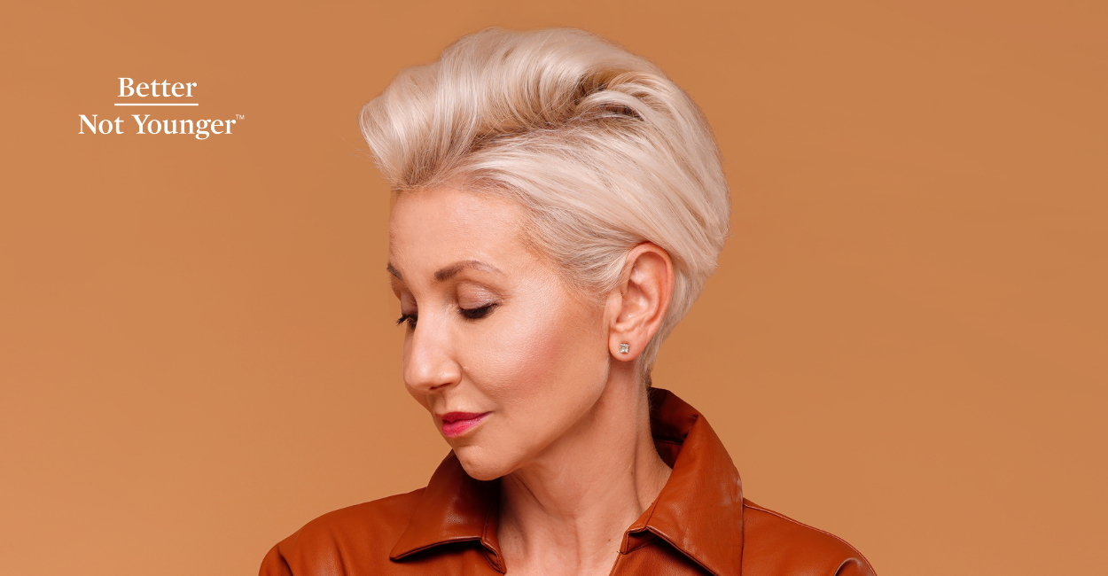 Better Not Younger features a woman with short blonde hair wearing a hairstyle that hides hair thinning hair and her wide hair part